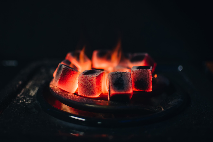 Hot Coals for Shisha Warmed up on the Stove